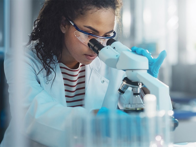 Picture of lady with microscope