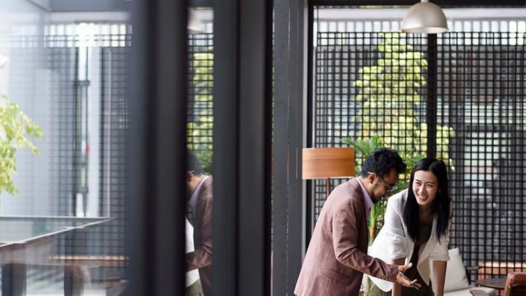 Two people working