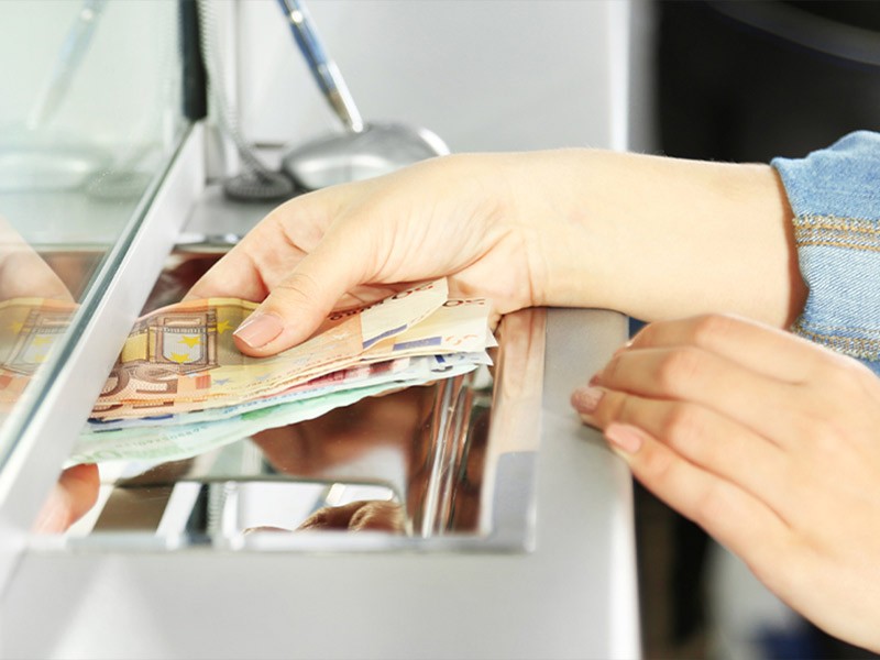 Woman at bank teller