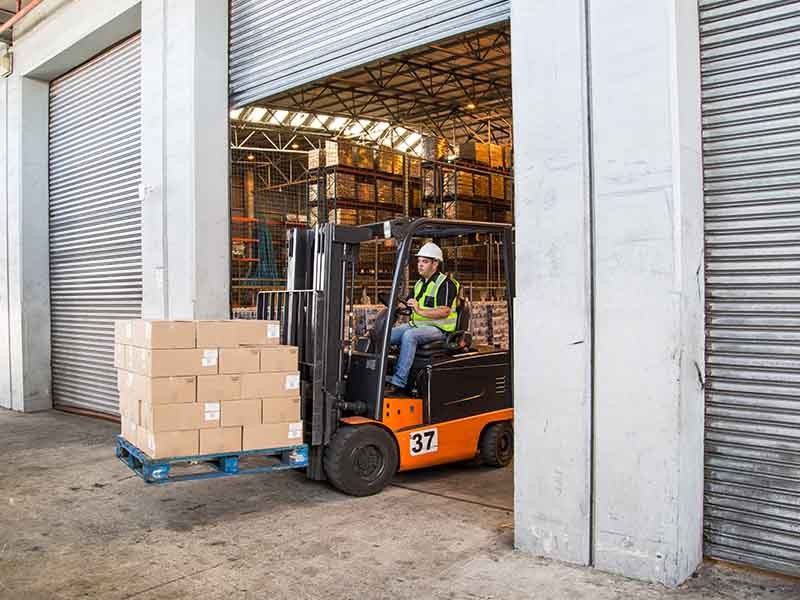 Man driving a forklift