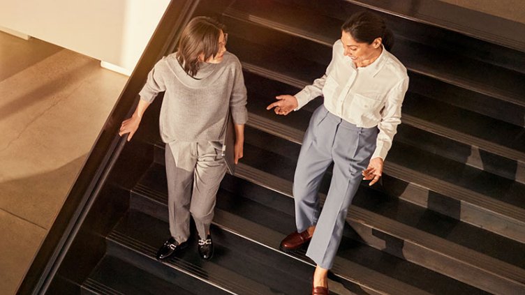 People walking down stairs