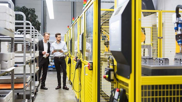 People testing machinery