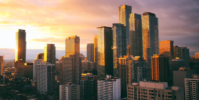 Toronto's futuristic cityscape during a marvelous sunset with skies painted with amazing palette of colours.