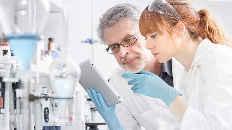 Health care researchers working in life scientific laboratory.