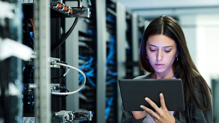 Woman is looking into tablet