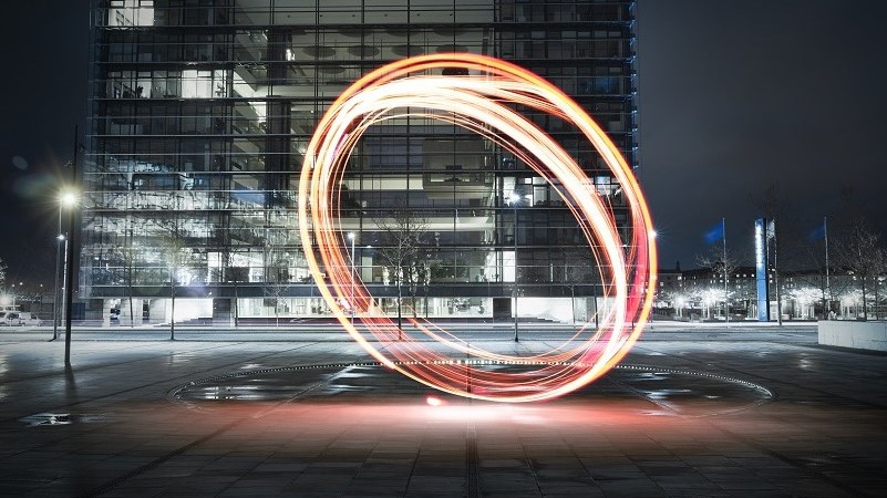 Innovation district building with lighted sculpture