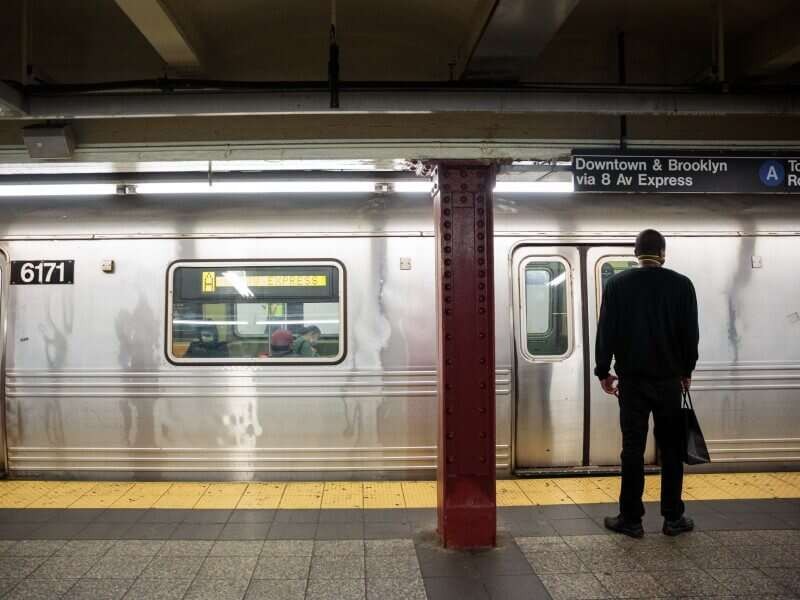 Office worker waiting for metro