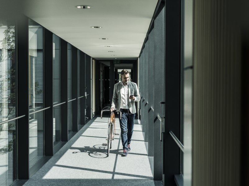 employees travelling to the office on bicycle