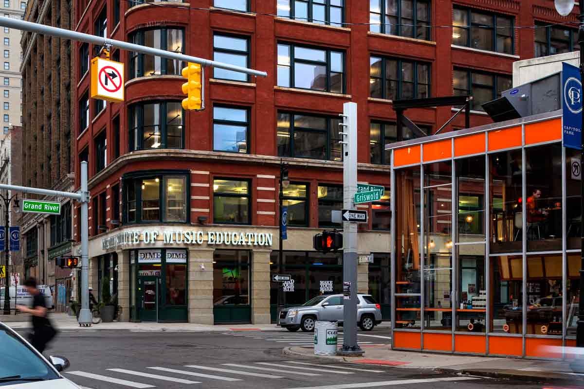 fast paced shot of red buildings with huge windows 