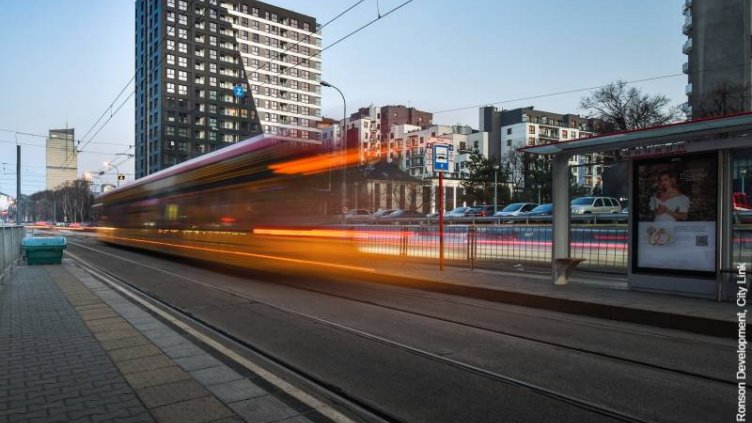 Vehicles running on the road in Warsaw