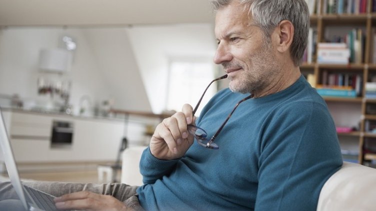 Man is working on laptop