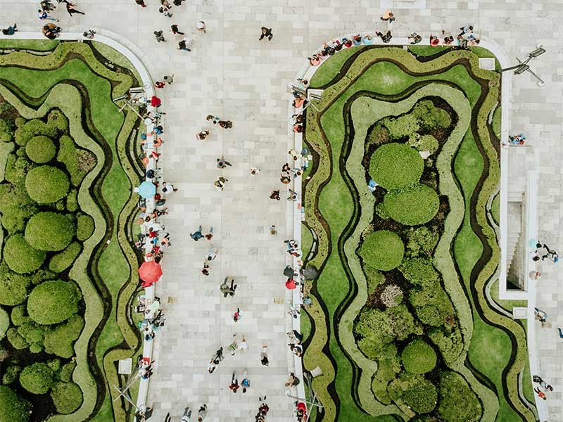 People walking on the urban garden