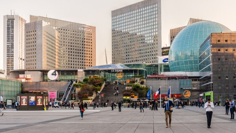 PARIS, FRANCE - SEPTEMBER 7, 2016: Skyscrapers in business district of Defense to west of Paris at sunset. Defense is biggest business district in France and most of large companies have offices here.; Shutterstock ID 685044589; Departmental Cost Code : 162800; Project Code: GBLMKT; PO Number: GBLMKT; Other: