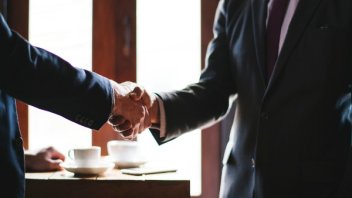 Businessmen shake hands