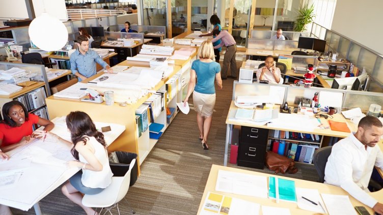 Interior Of Busy Modern Open Plan Office