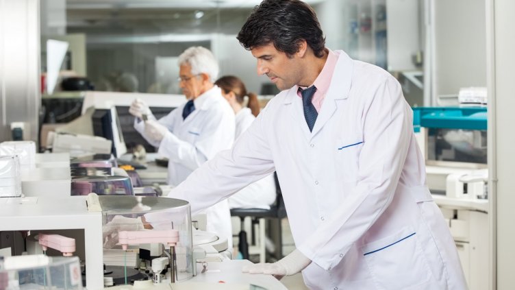 Mid adult male technician experimenting in laboratory using centrifuge; Shutterstock ID 226408627; Departmental Cost Code : 162800; Project Code: GBLMKT; PO Number: GBLMKT; Other: 