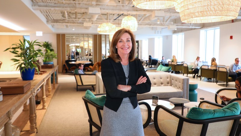 JLL Global CHRO Mary Bilbrey inside Aon Center's Cloud Level in Chicago