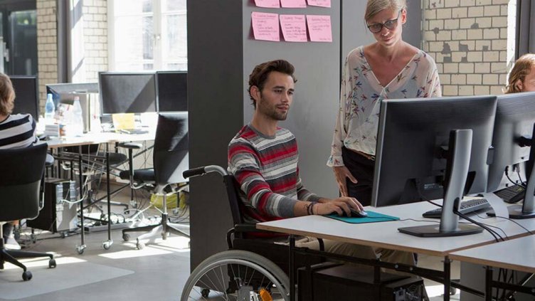 People working in the shared workspace