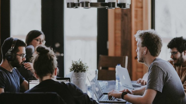 team members working together in coworking space