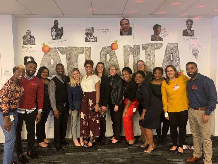 Group image of JLL employees in a local event