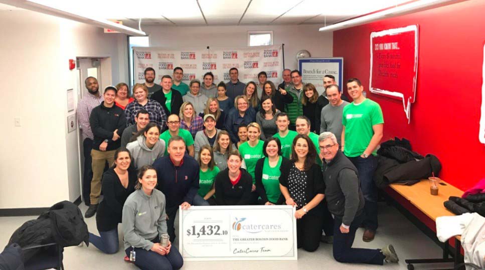 Group image of employees inside an office