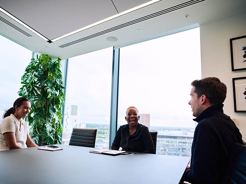 People talking in conference room