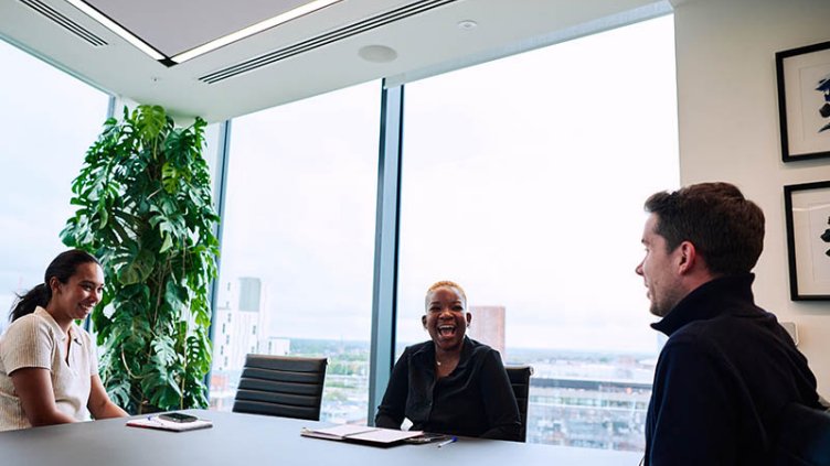 People talking in conference room